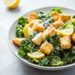 Baby Kale Salad with Lemon Dressing and Parmesan Croutons