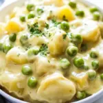 Cheesy Creamed Peas and Potatoes